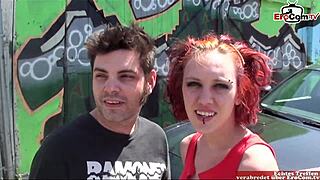 A slender red haired punk woman with petite breasts has sexual intercourse