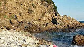 walking naked on public beach with pebbles insertion