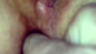 finger fucking my wife's pink wet pussy in this amateur video