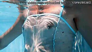 Hot Hungarian teen Lana swims nude in the pool, showing her juicy ass underwater.