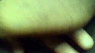 ebony woman fingers her shaved pussy