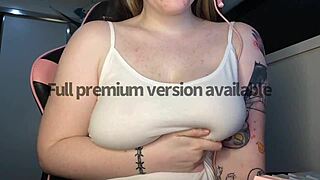tight white singlet hugging massive boobs for preview