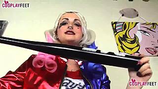 In ebony stockings Harley Quinn uses seductive foot play
