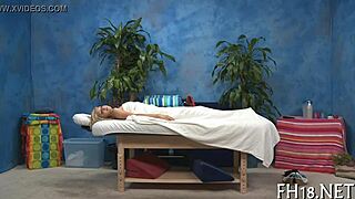 Intense emotions build during sensual massage session.