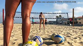 Do you see that big African ass on the beach volleyball court?