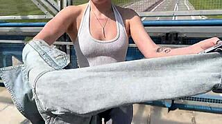 having a risky romp on the public pedestrian bridge