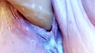 Creamy solo dildoing in wet bathtub pussy