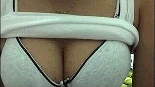 that girl with big tits is showing off on webcam