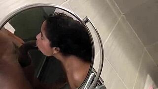 brunette secretly gives her lover a blowjob in public