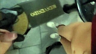 Beautiful Latina with long hair gets a cum shower in a public bathroom