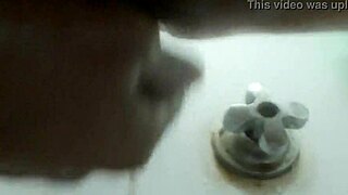 Enjoying some gay sex in the shower with my dildo