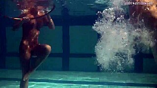 Lesbian underwater acrobatics with big tits and tight asses