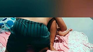 mayemarc1 shows a delicious brunette on the bed in an uncut amateur video