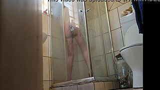 Caught my blonde stepmom fucking her pussy with a glass dildo in the shower!