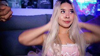 A blonde with a shaved body has sex while on her hands and knees with a big ass.