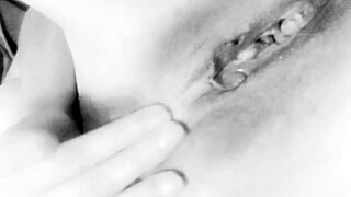 Beautiful amateur with big natural tits uses dildo on her ass close up