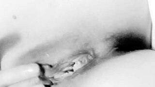 Beautiful amateur with big natural tits uses dildo on her ass close up