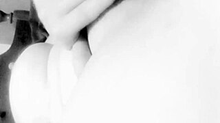 Beautiful amateur with big natural tits uses dildo on her ass close up