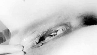 Beautiful amateur with big natural tits uses dildo on her ass close up