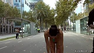 Public fetish action with a hot brunette bound and fucked.