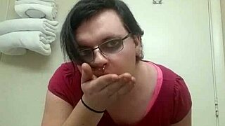 Shemale in panties performs striptease ripping clothes while teasing transsexual crossdressing