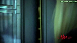 Steamy lesbian scene with goth babes and piercing details