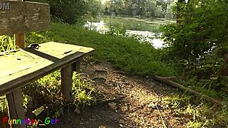 very publicly on a bench by the lake i relax with friends in outdoor setting