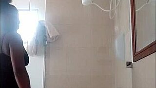 Shower time fun with ebony teen and her sex toys