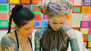 Goth girls in latex enjoy anal sex with ass fingering and fisting