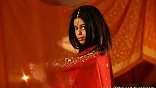 Beautiful brunette undresses while dancing teasingly.