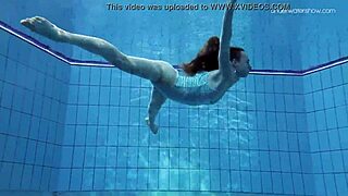 The Russian beauty, Anna Netrebko in a stripy swimsuit gives a small tit show