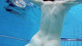 The Russian beauty, Anna Netrebko in a stripy swimsuit gives a small tit show