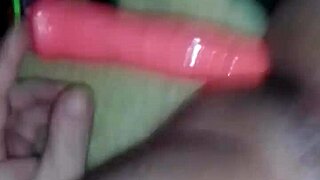Playing with sex toys at night and watching porn movies