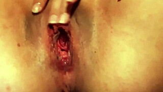 Hot babe with big tits and ass using dildo