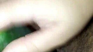 Claudia uses her cucumber for pleasure