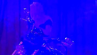 The hot stepmom performs a flexible striptease on stage, undressing seductively