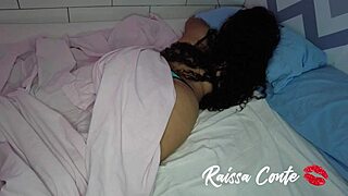 Brunette bombshell in lingerie flaunts her curves and assets