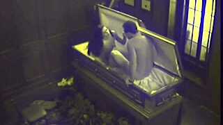 Couple gets caught fucking hardcore in coffin on hidden camera