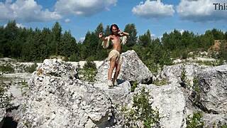 Topless dancing in a white stone quarry