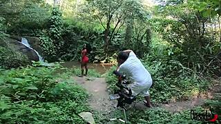 Ebony teen bruna black poses with big ass in outdoor stream photos