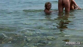 three busty teens naked on beach