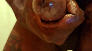 Hallelujah Johnson uses lubricant while masturbating her big black cock