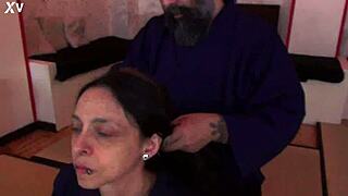 Pat Foster in bondage with BDSM toys and spanking
