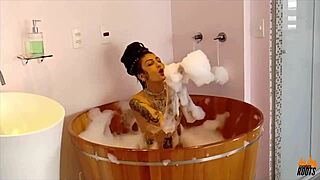 brazilian model with tattoo in ofuro during photo shoot