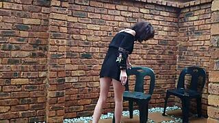 A petite amateur shares a kinky fetish video of herself urinating while smoking a cigarette and dancing