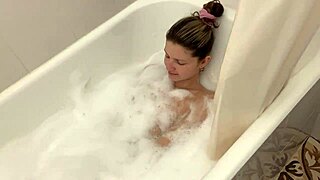 Skinny blonde and young lesbian amateurs enjoy small tits play in bathroom webcam.