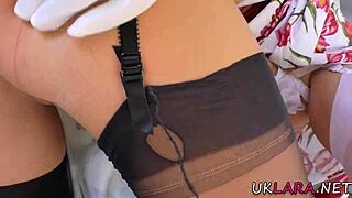 Mature milf in stockings and heels licks and fingers another woman outdoors in european setting