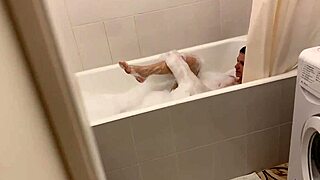 Skinny blonde and young lesbian amateurs enjoy small tits play in bathroom webcam.