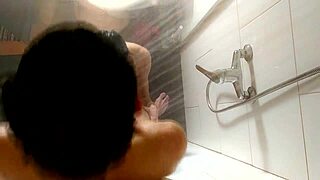 Blonde amateur blows big cock in shower, bent over for cum.