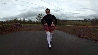 Amateur brunette gets into a schoolgirl costume and exposes herself